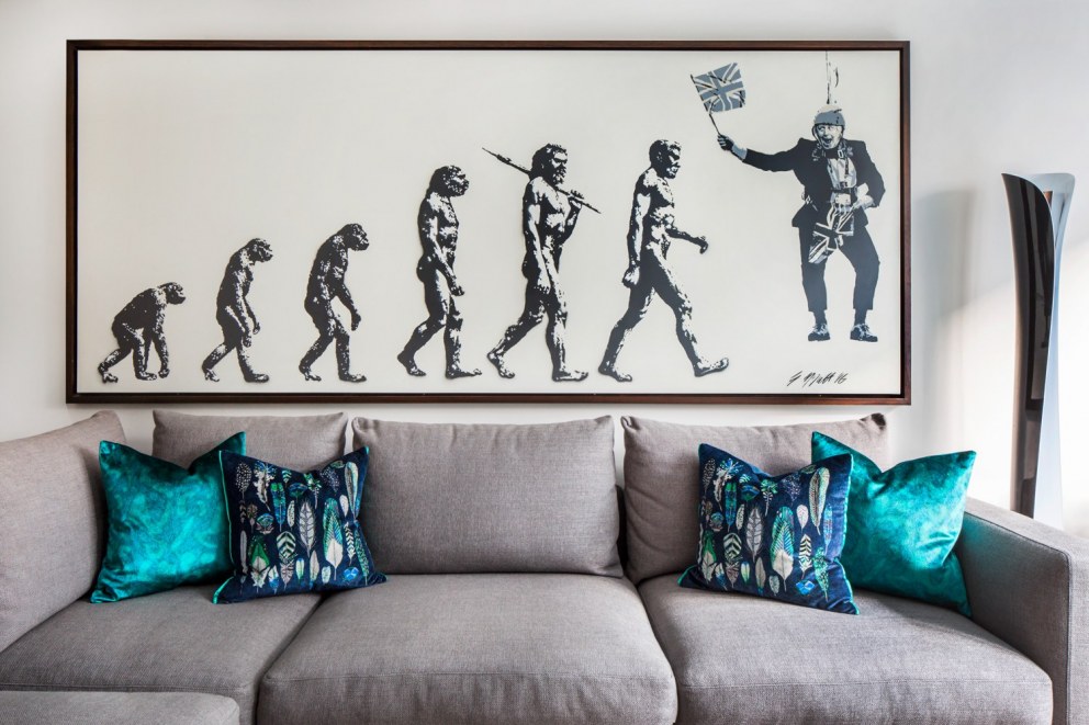 Contemporary refurbishment of Islington residence | Sofa and artwork | Interior Designers